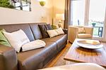 Wohnzimmer - FeWo12: Terrasse, Sauna, Schwimmbad - Top-Hundeurlaub