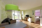 Wohnzimmer - FeWo31: Terrasse, Sauna, Schwimmbad - Top-Hundeurlaub