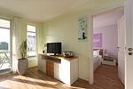 Wohnzimmer - FeWo31: Terrasse, Sauna, Schwimmbad - Top-Hundeurlaub
