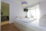 Schlafzimmer - FeWo31: Terrasse, Sauna, Schwimmbad - Top-Hundeurlaub