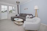Wohnzimmer - FeWo 02 MEERsand: Terrasse - Top-Hundeurlaub