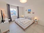 Schlafzimmer - FeWo 05 MEERhafen: Terrasse - Top-Hundeurlaub