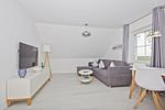 Wohnzimmer - FeWo 11 MEERbucht: Gartennutzung - Top-Hundeurlaub