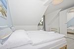 Schlafzimmer - FeWo 11 MEERbucht: Gartennutzung - Top-Hundeurlaub