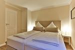 Schlafzimmer - Ferienwohnung Pebbles - Top-Hundeurlaub