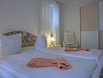 Schlafzimmer - Ferienwohnung i25 - Top-Hundeurlaub