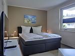 Schlafzimmer - Ferienwohnung KWF 2b OG - Top-Hundeurlaub
