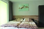 Wohnzimmer - Ferienwohnung KWV11EG "Seefrosch im Küstenwald" - Top-Hundeurlaub