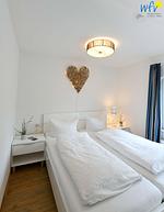Schlafzimmer - Ferienwohnung Sandröschen - Top-Hundeurlaub