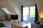 Wohnbereich mit Zugang zum Balkon - Sonnendeck - Top-Hundeurlaub