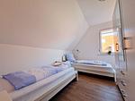 Schlafzimmer - Ferienwohnung Strandflieder - Top-Hundeurlaub