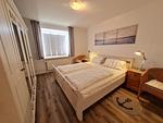 Schlafzimmer - Ferienhaus Ellen, EG Whg. - Top-Hundeurlaub