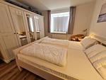 Schlafzimmer - Ferienhaus Ellen, EG Whg. - Top-Hundeurlaub