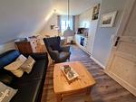 Wohnzimmer - Ferienhaus Ellen, OG Whg. - Top-Hundeurlaub