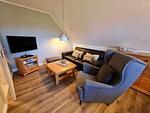 Wohnzimmer - Ferienhaus Ellen, OG Whg. - Top-Hundeurlaub