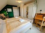 Schlafzimmer - Ferienhaus Ellen, OG Whg. - Top-Hundeurlaub