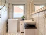 Badezimmer mit Waschmaschine - Haus 32c - Top-Hundeurlaub