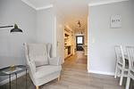 gemütlicher Lesesessel im Wohnbereich - Wohnung 18-3 - Top-Hundeurlaub
