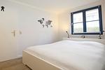 Schlafzimmer mit Doppelbett - Wohnung 18-3 - Top-Hundeurlaub
