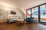 Wohnzimmer mit 3-er Sofa - Wohnung 03-6 - Top-Hundeurlaub