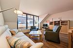 Wohnzimmer mit Zugang zum Balkon - Wohnung 03-6 - Top-Hundeurlaub