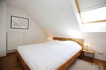 zweites Schlafzimmer im Dachgeschoss - Wohnung 03-6 - Top-Hundeurlaub