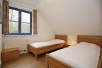 erstes Schlafzimmer mit Einzelbetten - Wohnung 03-8 - Top-Hundeurlaub
