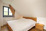 zweites Schlafzimmer mit Doppelbett - Wohnung 03-8 - Top-Hundeurlaub