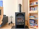 Kamin im Wohnzimmer - Haus 26b - Top-Hundeurlaub
