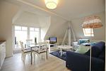 Wohnzimmer mit Essbereich - Wohnung 06 - Top-Hundeurlaub