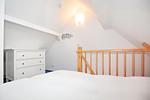 2. Schlafzimmer oben mit Schrank - Wohnung 05 - Top-Hundeurlaub