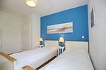 zweites Schlafzimmer mit Einzelbetten - Wohnung 122 - Top-Hundeurlaub