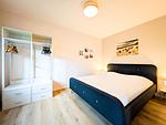 Schlafzimmer mit Doppelbett - Wohnung 05 - Top-Hundeurlaub