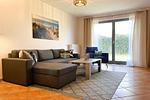 Wohnzimmer mit Zugang zur Terrasse - Wohnung 05 - Top-Hundeurlaub