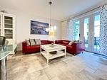 Wohnzimmer mit Sofaecke - Wohnung 02 - Top-Hundeurlaub