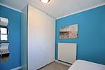 Schlafzimmer mit Doppelbett und Kleiderschrank - Wohnung 10-2 - Top-Hundeurlaub