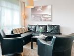 Sofaecke und Sessel im Wohnbereich - Wohnung 13 - Top-Hundeurlaub