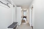 Eingangsbereich mit Schrank und Blick zum Wohnzimmer - Wohnung 05-8 - Top-Hundeurlaub