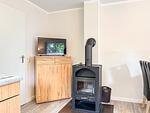 Wohnzimmer mit Kamin - Haus 25d - Top-Hundeurlaub
