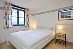 Schlafzimmer mit Doppelbett - Wohnung 01-3 - Top-Hundeurlaub