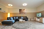 Wohnzimmer mit Sitzecke - Reethaus 20b - Top-Hundeurlaub
