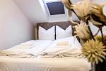 Schlafzimmer - Ferienwohnung 107 - Top-Hundeurlaub