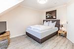 Schlafzimmer - Ferienwohnung 203 - Top-Hundeurlaub