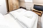 Schlafzimmer - Ferienwohnung 203 - Top-Hundeurlaub