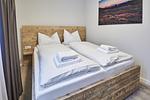 Schlafzimmer - Ferienwohnung 810 - Top-Hundeurlaub