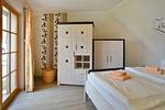 Schlafzimmer mit Doppelbett - Wohnung 1.6 - Freesenblick - Top-Hundeurlaub