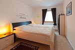 Schlafzimmer mit Doppelbett - Wohnung 4.2 - Ostseeperle - Top-Hundeurlaub