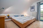 Schlafzimmer mit Doppelbett - Doppelhaushälfte 12 - Sommerlust - Top-Hundeurlaub