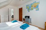 3. Schlafzimmer mit Doppelbett und Kleiderschrank - Haus Zeitlos - Top-Hundeurlaub