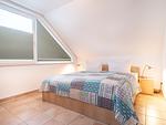 Schlafzimmer mit Doppelbett - Wohnung 5-73 - Top-Hundeurlaub